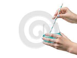Female hands with cocktail glass  on white background