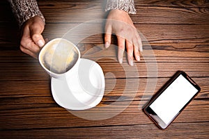 Female hands and coffee