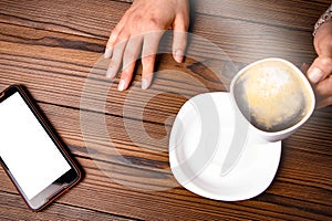 Female hands and coffee