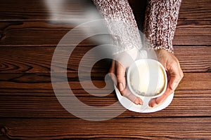 Female hands and coffee