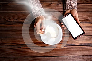 Female hands and coffee