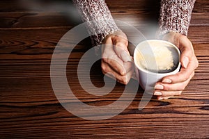 Female hands and coffee