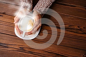 A female hands and coffee
