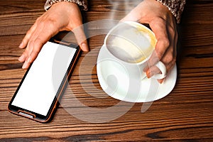 A female hands and coffee