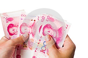 Female hands counting money in Chinese yuan