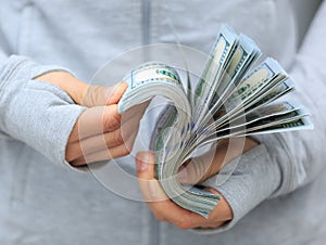 Female hands counting money