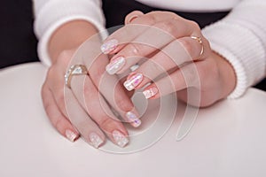 Female hands with festive manicure nails