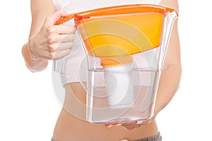 Female hands filter for water