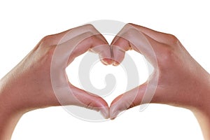 Female hands in the form of heart isolated on white
