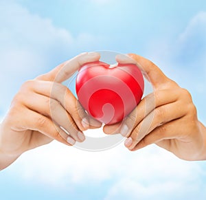 Female hands with heart