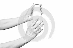 female hands hold shampoo bottle with copy space