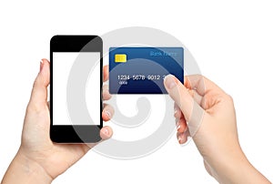 female hands holding phone and credit card on isolated background