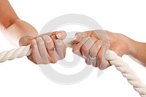 Female hands holding rope