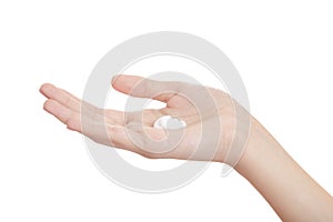 Female hands isolated on white background. Moisturizing hands with cream. Applying the cream to the skin