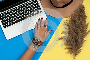 Female hands with jewelry. Fashion accessories, wrist watches, glamor bracelets