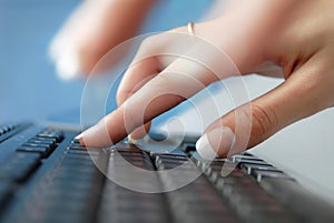 Female hands on keyboard