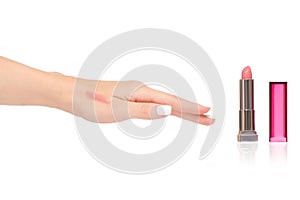 Female hands with lipstick pink
