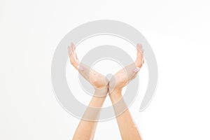 Female hands measuring invisible items, woman`s palm making gesture while showing small amount of something on white isolated