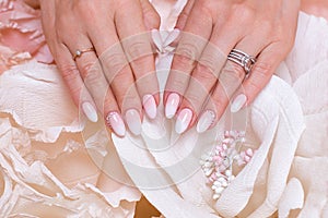 Female hands with ombre manicure nails