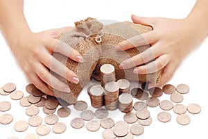 Female hands protects bags with money