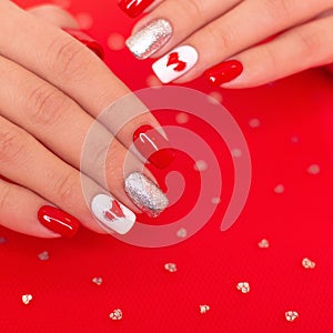 Female hands with red manicure nails