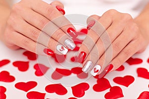 Female hands with red manicure nails