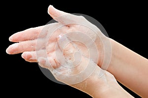 Female hands in soapsuds photo