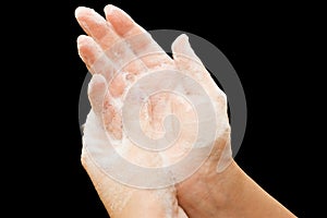 Female hands in soapsuds photo