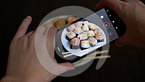 Female Hands Taking Photos of Prepared Food on a Smartphone on Table. 4K