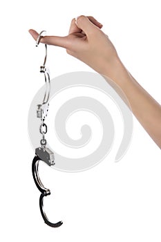 Female hands in tight fist on handcuff on white isolated background