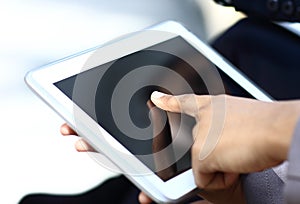 Female hands touching digital tablet