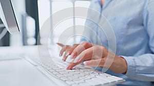 Female hands typing credit card number on computer keyboard. Woman making online purchase. Online payment service.