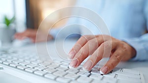 Female hands typing credit card number on computer keyboard. Woman making online purchase. Online payment service.