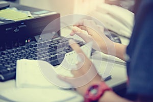 Female hands typing keyboard for input data