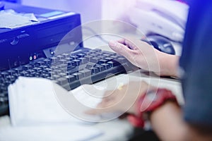 Female hands typing keyboard for input data