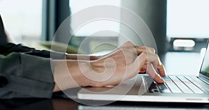 Female hands typing laptop keyboard and touching touchpad. Woman working with notebook. Hands close up view