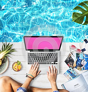 Female Hands Typing Macbook Poolside Concept photo