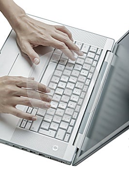 Female hands using keyboard