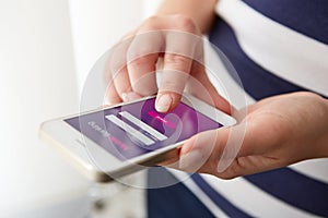 Female hands using mobile banking