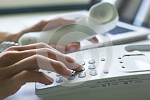 Female hands using phone. Businesswomen.