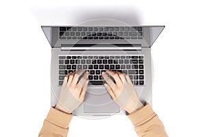 Female hands working on new laptop  on white background