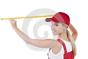 Female handworker with tape measure