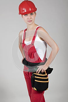 Female handworker with toolbelt