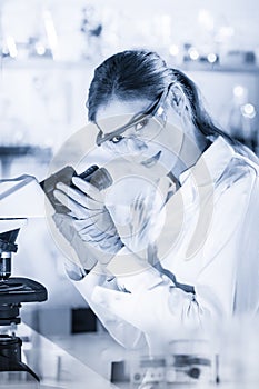 Female health care researchers working in scientific laboratory.