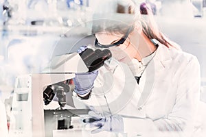 Female health care researchers working in scientific laboratory.