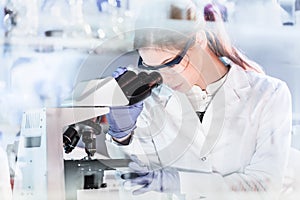 Female health care researchers working in scientific laboratory.