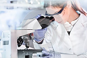 Female health care researchers working in scientific laboratory.