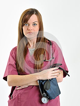 Female healthcare professional with blood pressure cuff