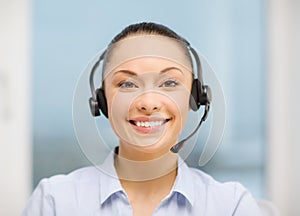 Female helpline operator with headphones