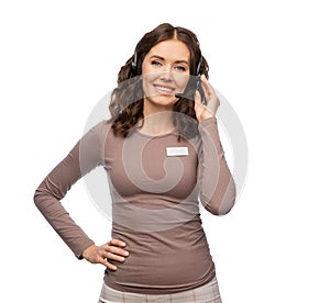 female helpline operator with headset and name tag